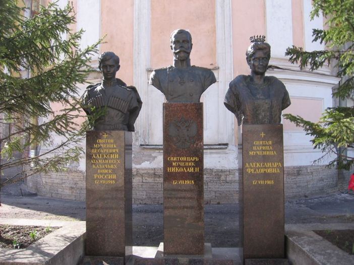 Busts of the Tsetsarevich Alexei, Emperor Nicholas II, and Empress Alexandra, all identified as "holy martyrs," outside the Theotokos of Tikhvin Church, Petrograd, April 25, 2015. Photo by the Russian Reader
