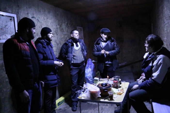 Striking truckers chatting with a visitor to their camp in Tyoply Stan. Photo by and courtesy of anatrrra