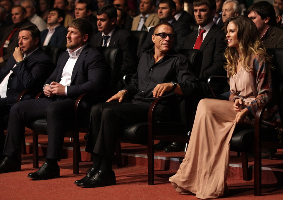 Chechen leader Ramzan Kadyrov, Belgian actor Jean-Claude Van Damme, and American actress Hilary Swank look on during a ceremony to mark Chechen leader Ramzan Kadyrov's 35th birthday and City Day celebrations in Grozny, Chechnya, Russia,  October 5, 2011. Photo by Maxim Shipenkov/EPA