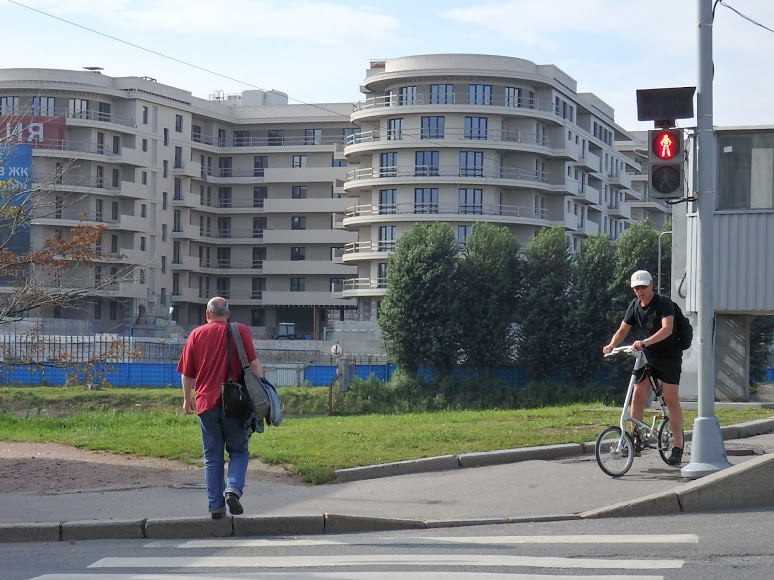 We crossed the Malaya Nevka River to Krestovsky Island, whose southeast shore is now being built over with overweening apartment blocks with names like Privilege (pictured) and Krestovsky de lux [sic]. 