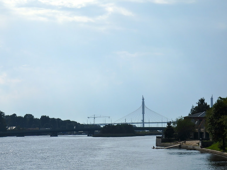 Speaking of which, that isn't Mothra on the horizon, but a bridge spanning the mouth of the Malaya Nevka between Krestovsky Island and Vasilievsky Island. The bridge is part of the nearly completed Western High-Speed Diameter highway (ZSD), which traverses the city from north to south along its waterfront. Thus, well into the 21st century, Petersburg city planners have decided to repeat the mistakes of European and US city planners of the 1960s and 1970s, who built multi-lane highways along rivers and shorelines, some of which were later dismantled because they made more human-friendly uses of these areas impossible. For more on the ZSD's traumatic visual impact on Petersburg, see Dmitry Ratnikov's August 15, 2016, on the website Kanoner.
